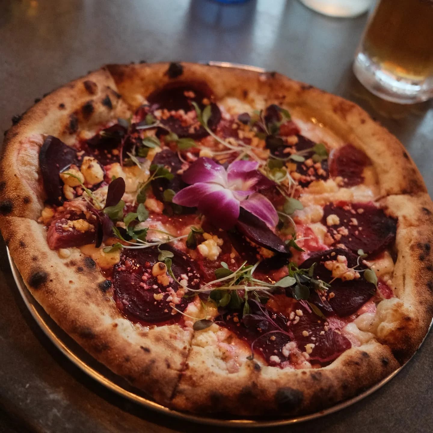 Olive oil, fresh mozzarella, feta, roasted beets, blood orange, micro greens, orchid.