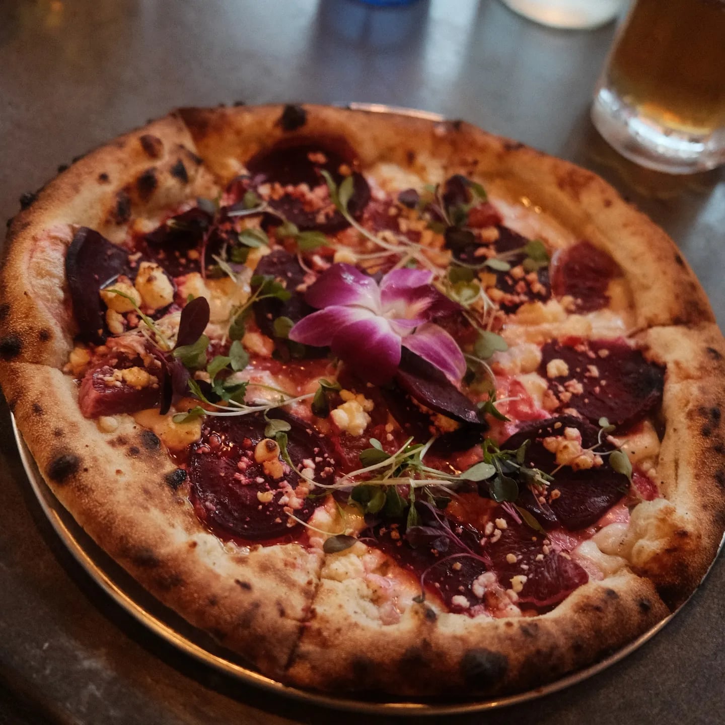 Olive oil, fresh mozzarella, feta, roasted beets, blood orange, micro greens, orchid.