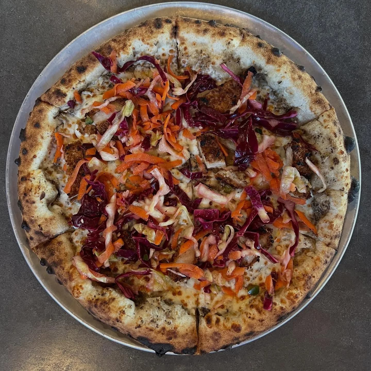 Mushroom cream sauce, mozzarella, pork schnitzel, coleslaw.