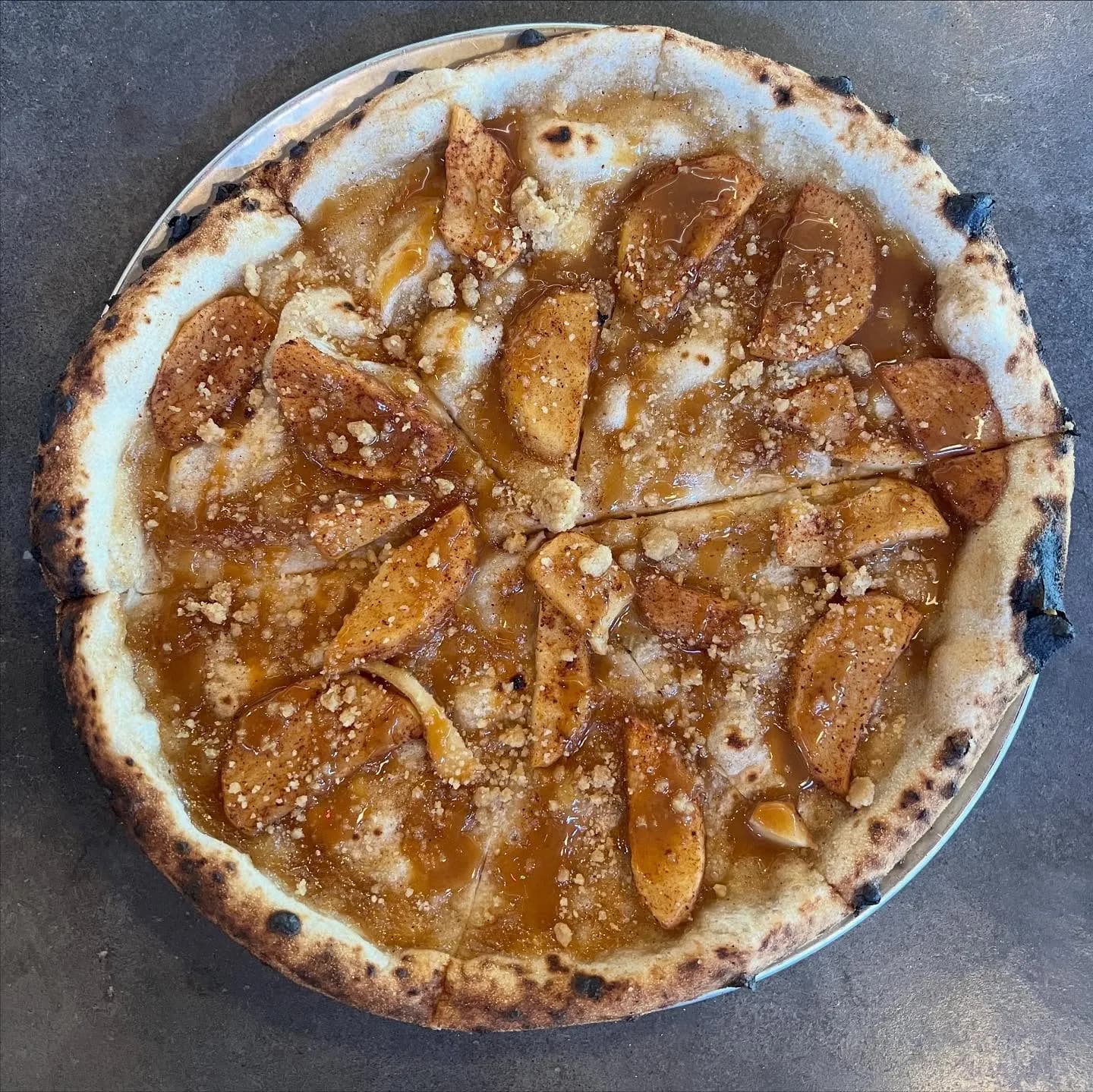 Apple butter, cooked apples, streusel, and caramel drizzle.
