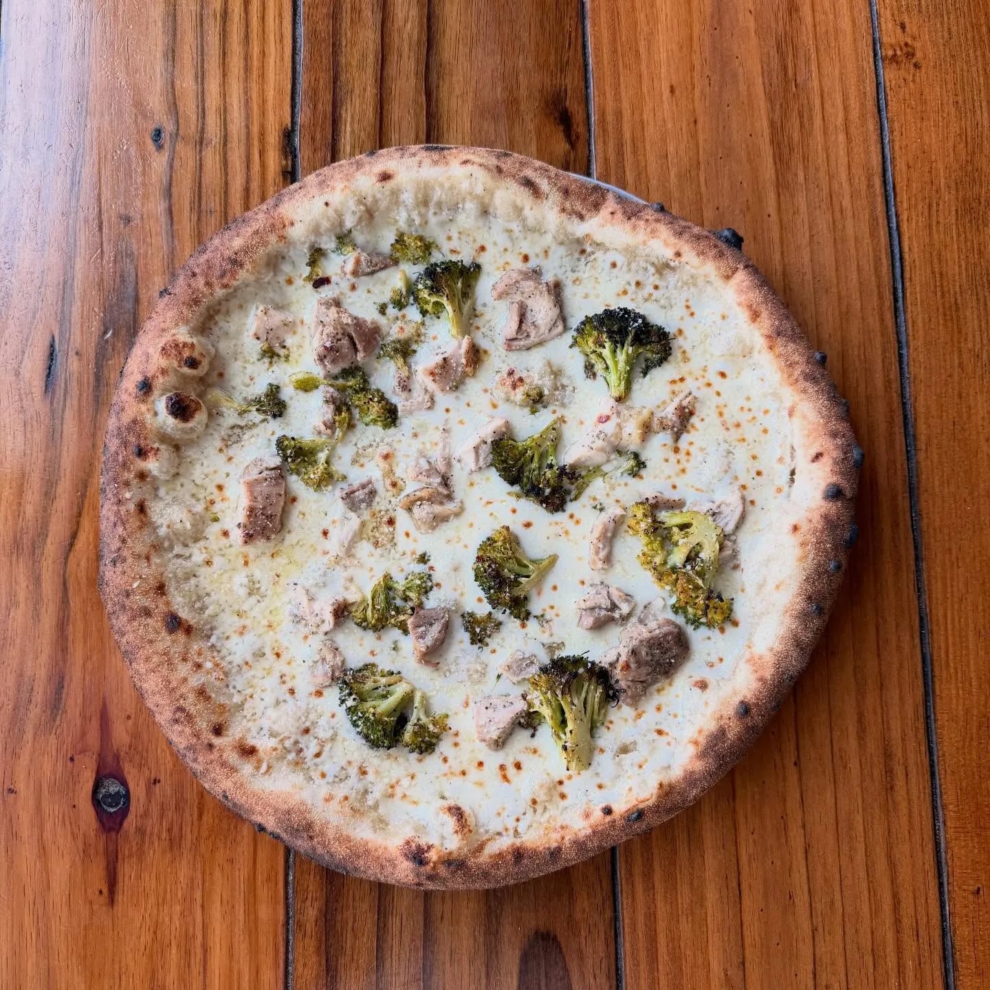 Alfredo sauce, mozzarella, chicken, and roasted broccoli